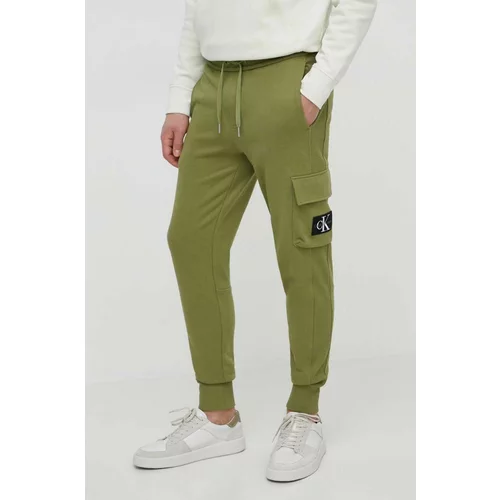 Calvin Klein Jeans Bombažen spodnji del trenirke zelena barva