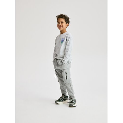 Reserved Cargo jogger hlače s džepovima - svijetlo siva Cene