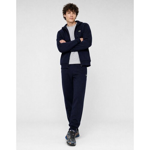 Lacoste Spodnji deli trenirke Pantalon de surv&amp;ecirc;tement en molleton tapered fit pisana Slike