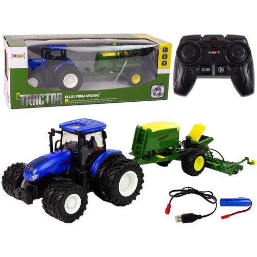 Blue tractor with baler Slike