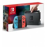 Nintendo switch console (red and blue joy-con)  cene