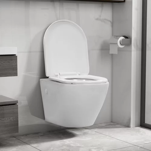 vidaXL Viseča WC školjka brez roba keramična bela