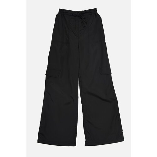 Trendyol black parachute fabric belted flare trousers  Cene